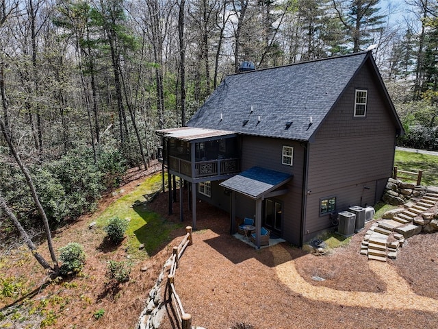 49 Lakeside Fls, Cullowhee, NC 28723 - rear view of property featuring stairway, roof with shingles, and central AC