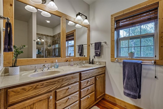 49 Lakeside Fls, Cullowhee, NC 28723 - full bath with a shower stall, baseboards, double vanity, and a sink