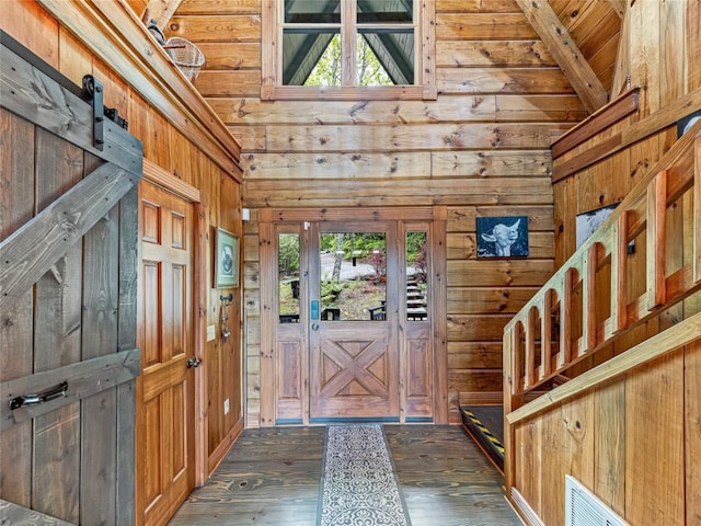 399 Toxaway Ct, Lake Toxaway, NC 28747 - foyer entrance featuring wooden walls, hardwood / wood-style floors, and wooden ceiling