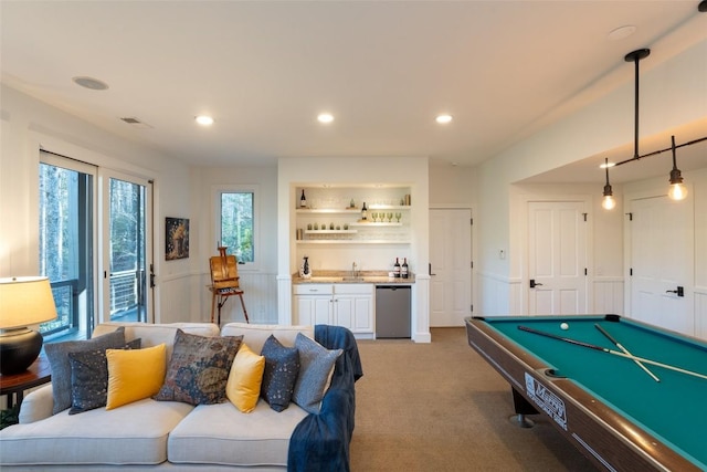 playroom featuring visible vents, a wainscoted wall, wet bar, recessed lighting, and light carpet