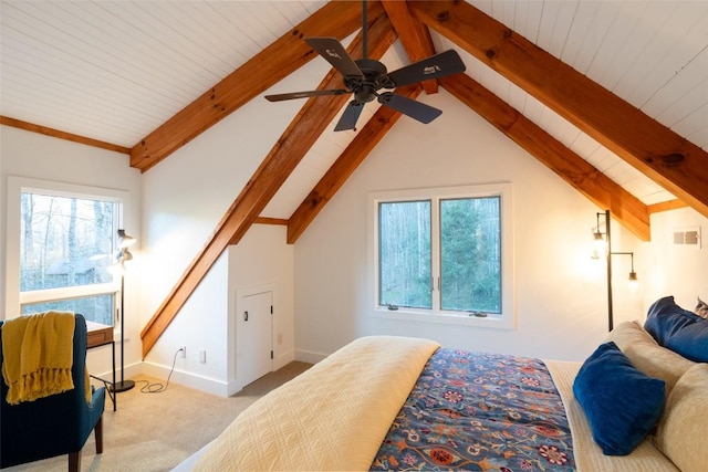 bedroom with visible vents, a ceiling fan, lofted ceiling with beams, carpet floors, and baseboards