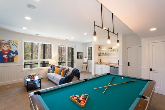 game room with wet bar, billiards, a sink, and light carpet