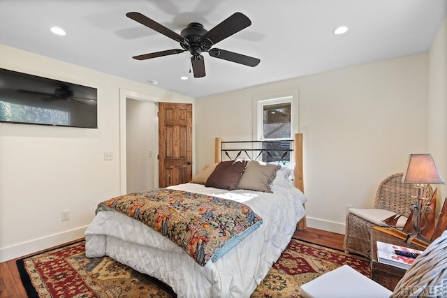 bedroom with hardwood / wood-style flooring and ceiling fan