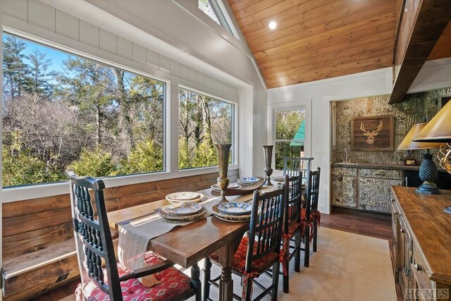 sunroom / solarium with wood ceiling and vaulted ceiling