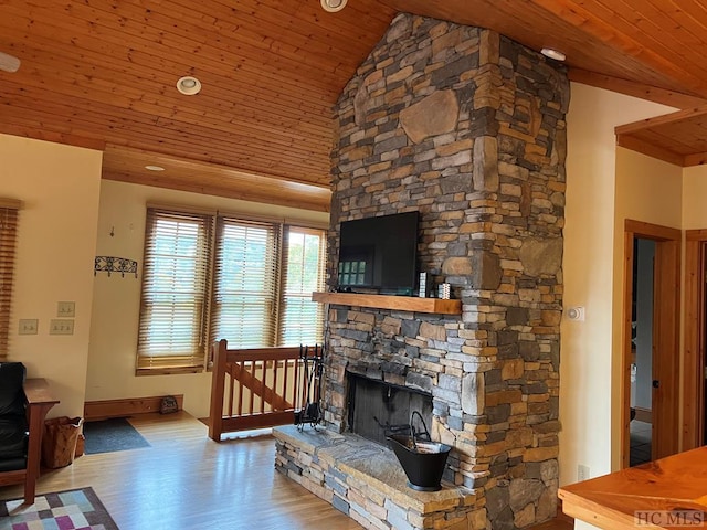 35-B Portland Rdg Unit B, Cashiers, NC 28717 - living area featuring wood ceiling, wood finished floors, a stone fireplace, high vaulted ceiling, and baseboards