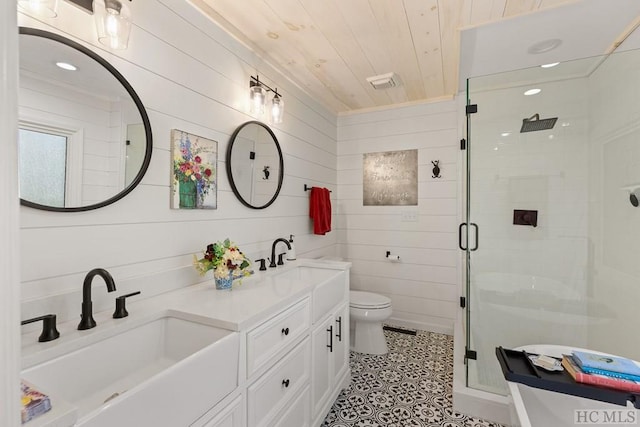 bathroom featuring toilet, wooden walls, an enclosed shower, wooden ceiling, and vanity