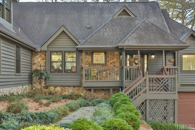 back of house with a porch