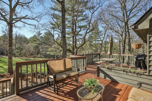 wooden terrace with grilling area