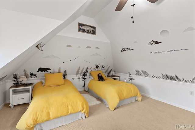 carpeted bedroom with lofted ceiling and ceiling fan