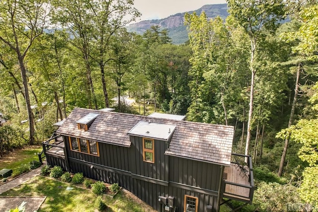 exterior space featuring a mountain view