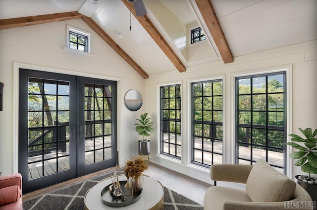 doorway to outside with vaulted ceiling with beams and french doors