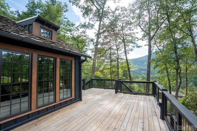 wooden terrace featuring a mountain view