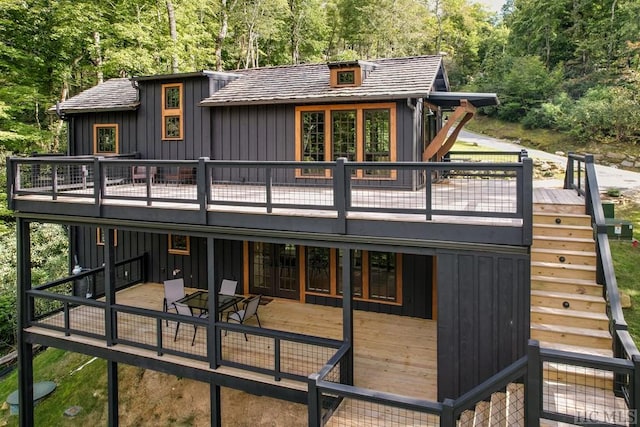 rear view of property with a deck