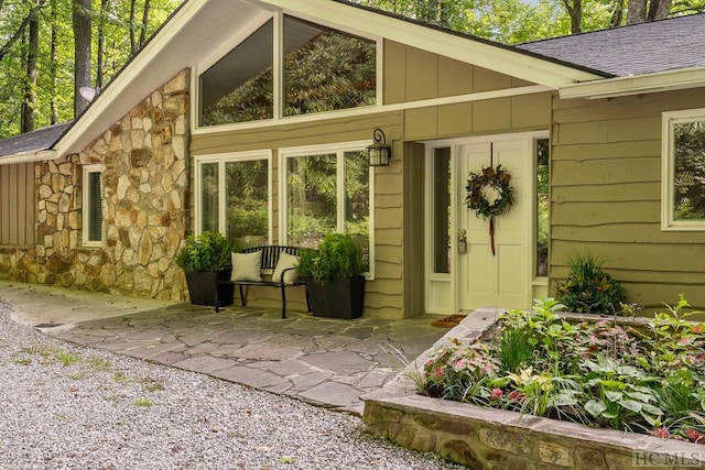 property entrance with a patio area