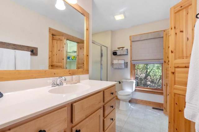 full bath featuring visible vents, tile patterned flooring, a stall shower, vanity, and toilet
