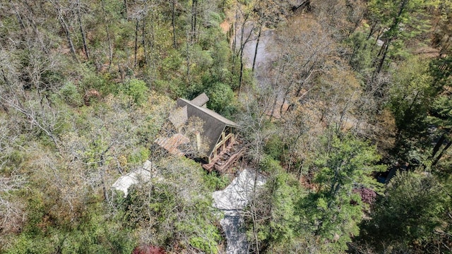 bird's eye view featuring a forest view