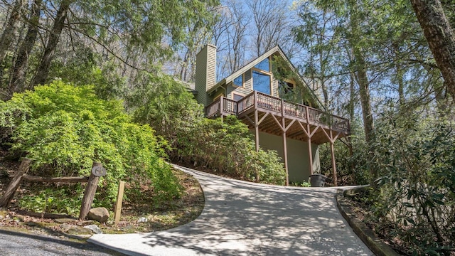 surrounding community featuring a wooden deck