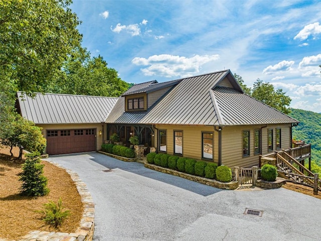 view of front of property with a garage