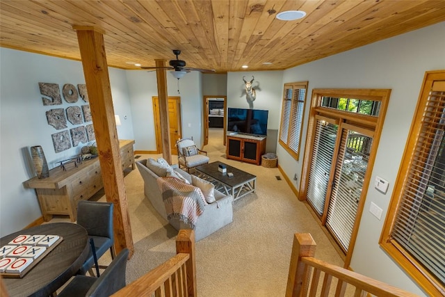 carpeted living room featuring ceiling fan, lofted ceiling, and wood ceiling