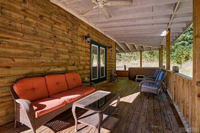 sunroom with wood ceiling, vaulted ceiling, and ceiling fan