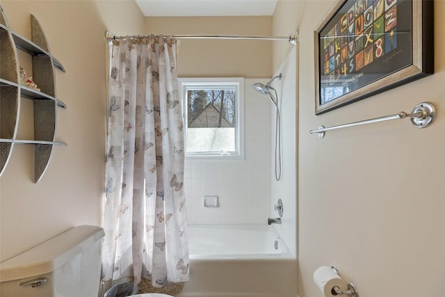 bathroom with shower / bathtub combination with curtain and toilet