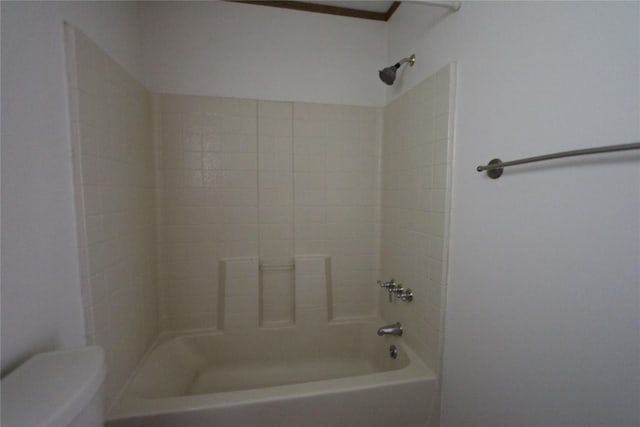 full bathroom with toilet and  shower combination