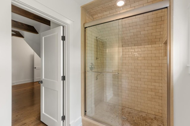 525 High Mountain Dr, Cashiers, NC 28717 - full bath with a shower stall, wood finished floors, baseboards, and lofted ceiling