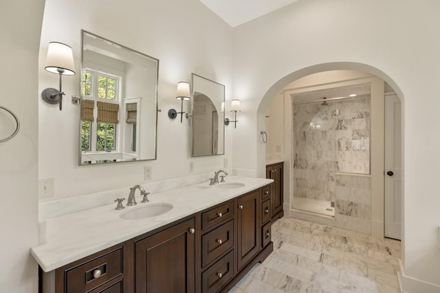 525 High Mountain Dr, Cashiers, NC 28717 - bathroom with a shower stall, double vanity, and marble look tile flooring
