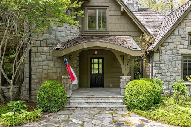 525 High Mountain Dr, Cashiers, NC 28717 - property entrance with a chimney and stone siding