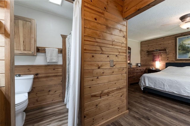 3050 N Hwy 107, Cashiers, NC 28736 - bedroom with wood walls, dark wood finished floors, crown molding, and a textured ceiling