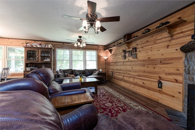 3050 N Hwy 107, Cashiers, NC 28736 - living room with wood walls, ceiling fan, and wood finished floors