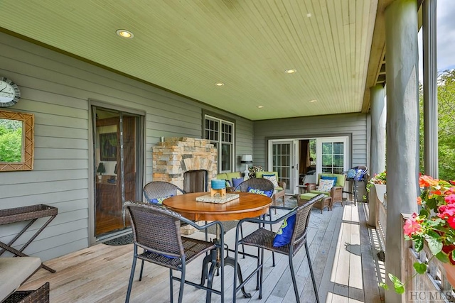 exterior space with french doors and wooden ceiling