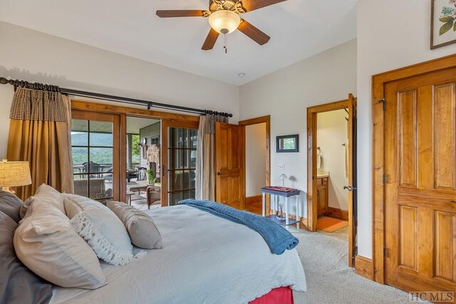 carpeted bedroom with ceiling fan, connected bathroom, and access to exterior