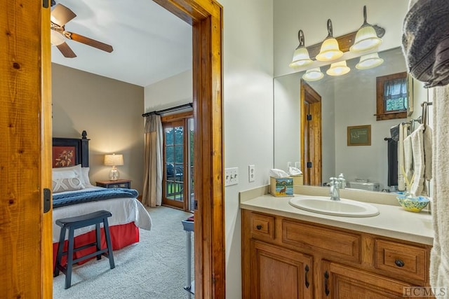 bathroom featuring ceiling fan and vanity