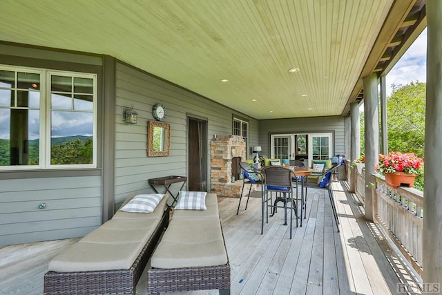 sunroom / solarium with wooden ceiling