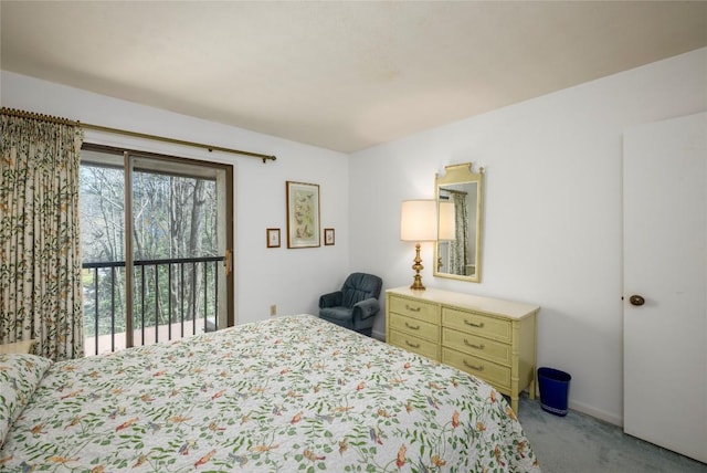bedroom featuring carpet flooring, access to exterior, and multiple windows