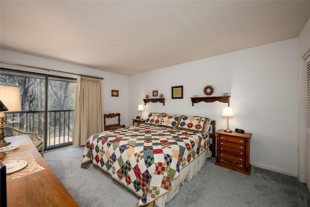 bedroom with access to exterior and carpet flooring