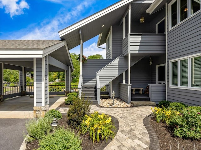 66 Country Club Vlg Unit 66, Lake Toxaway, NC 28747 - view of side of property with asphalt driveway and a carport
