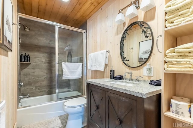 full bathroom featuring vanity, toilet, enclosed tub / shower combo, wooden walls, and wood ceiling