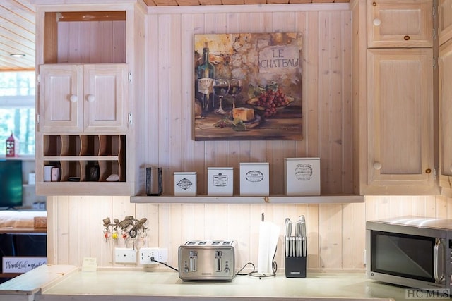 interior space featuring wooden walls