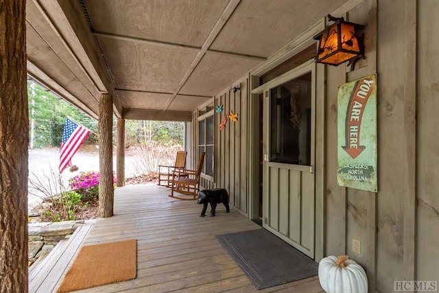 deck with covered porch