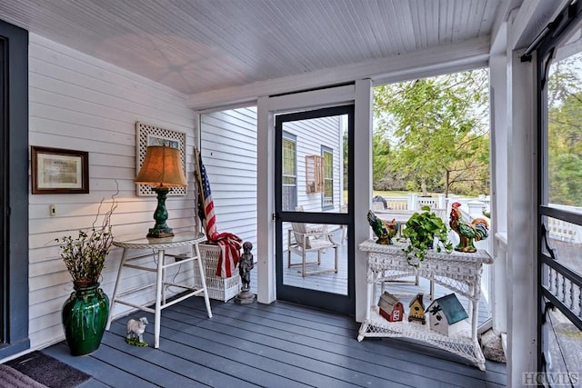 sunroom / solarium featuring a wealth of natural light