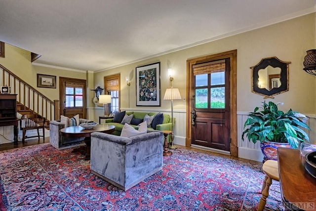 living room featuring crown molding