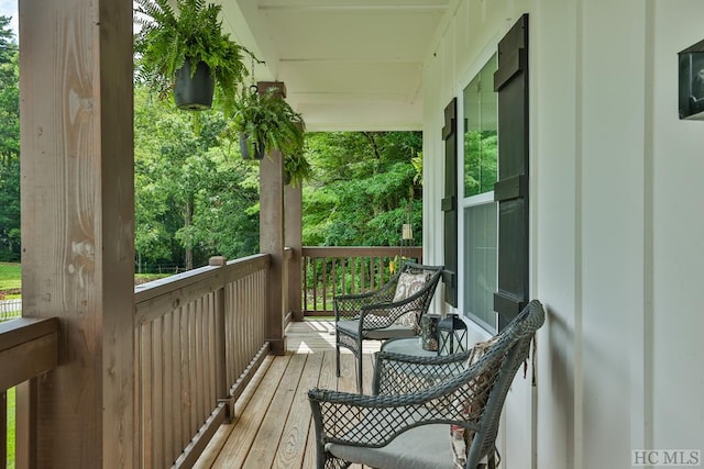 balcony featuring covered porch