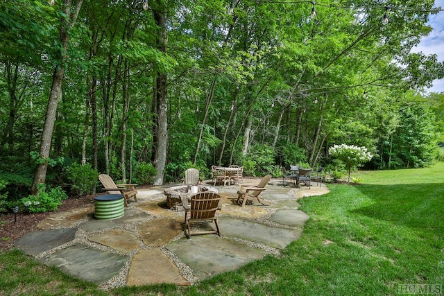 view of patio featuring an outdoor fire pit