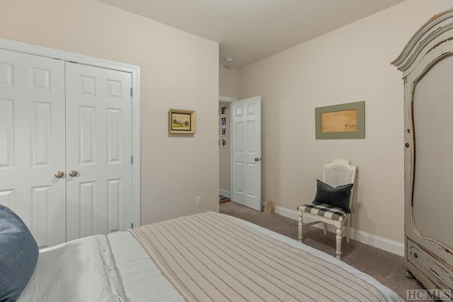 carpeted bedroom with a closet