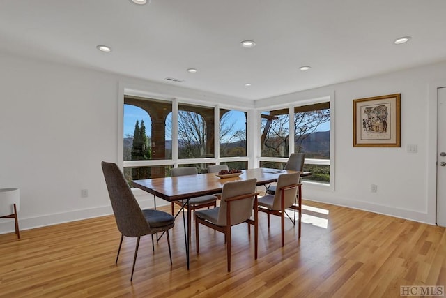 dining room with light wood-type flooring