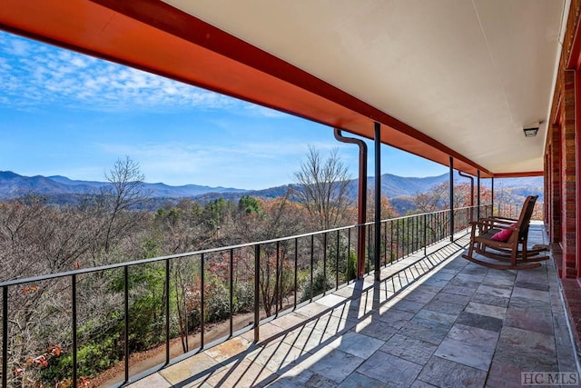 balcony featuring a mountain view