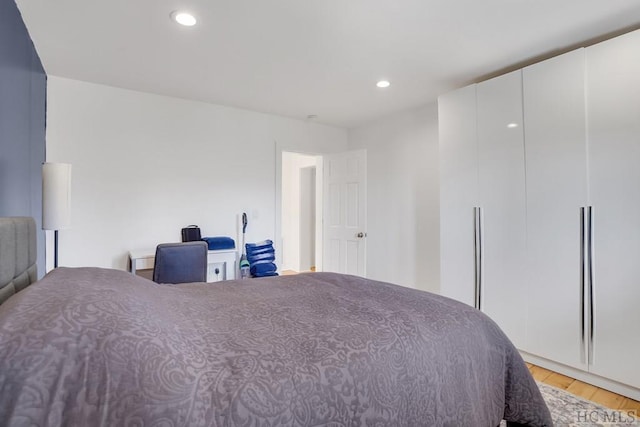 bedroom featuring light wood-type flooring