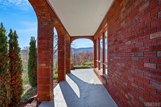 view of patio / terrace featuring a mountain view